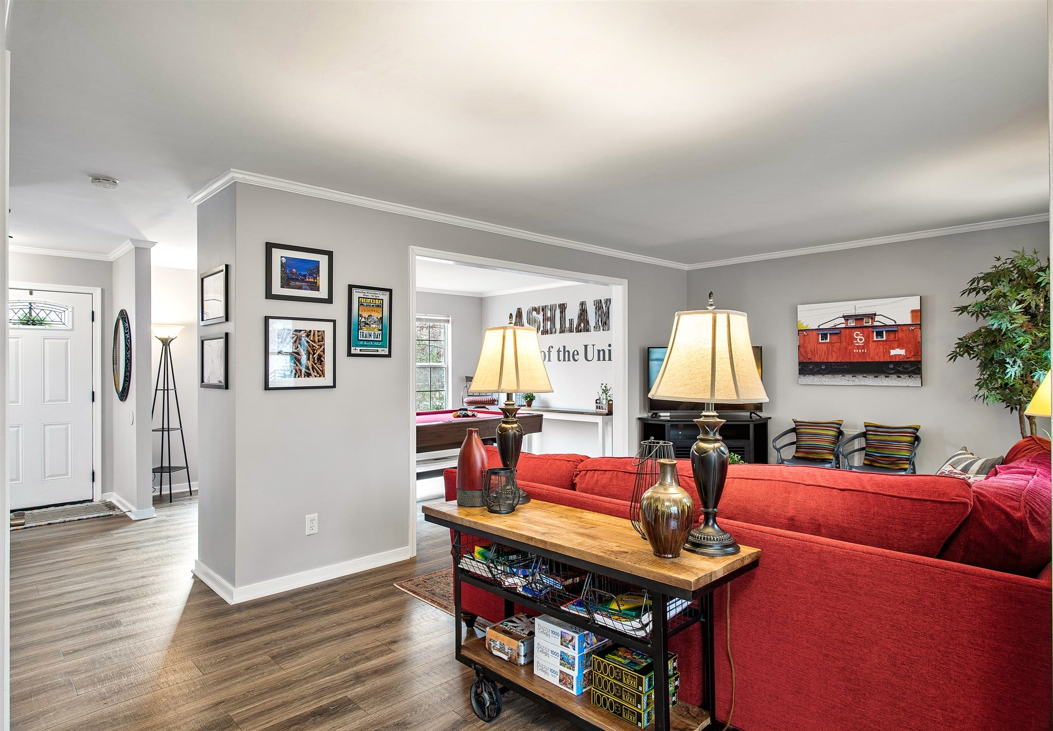 family room with red sofa
