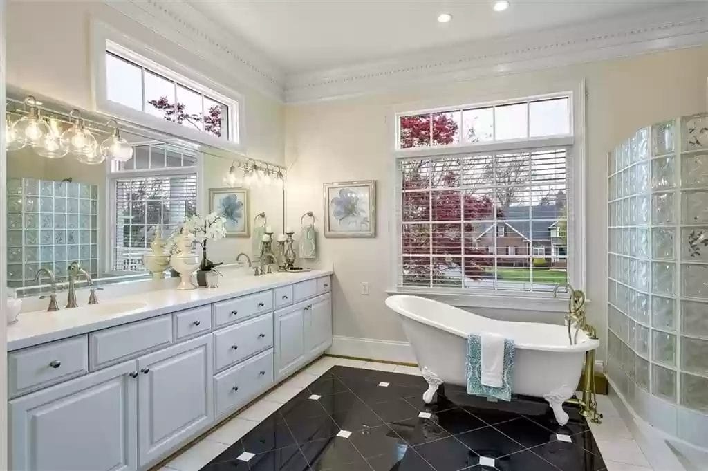 bathroom with black tile