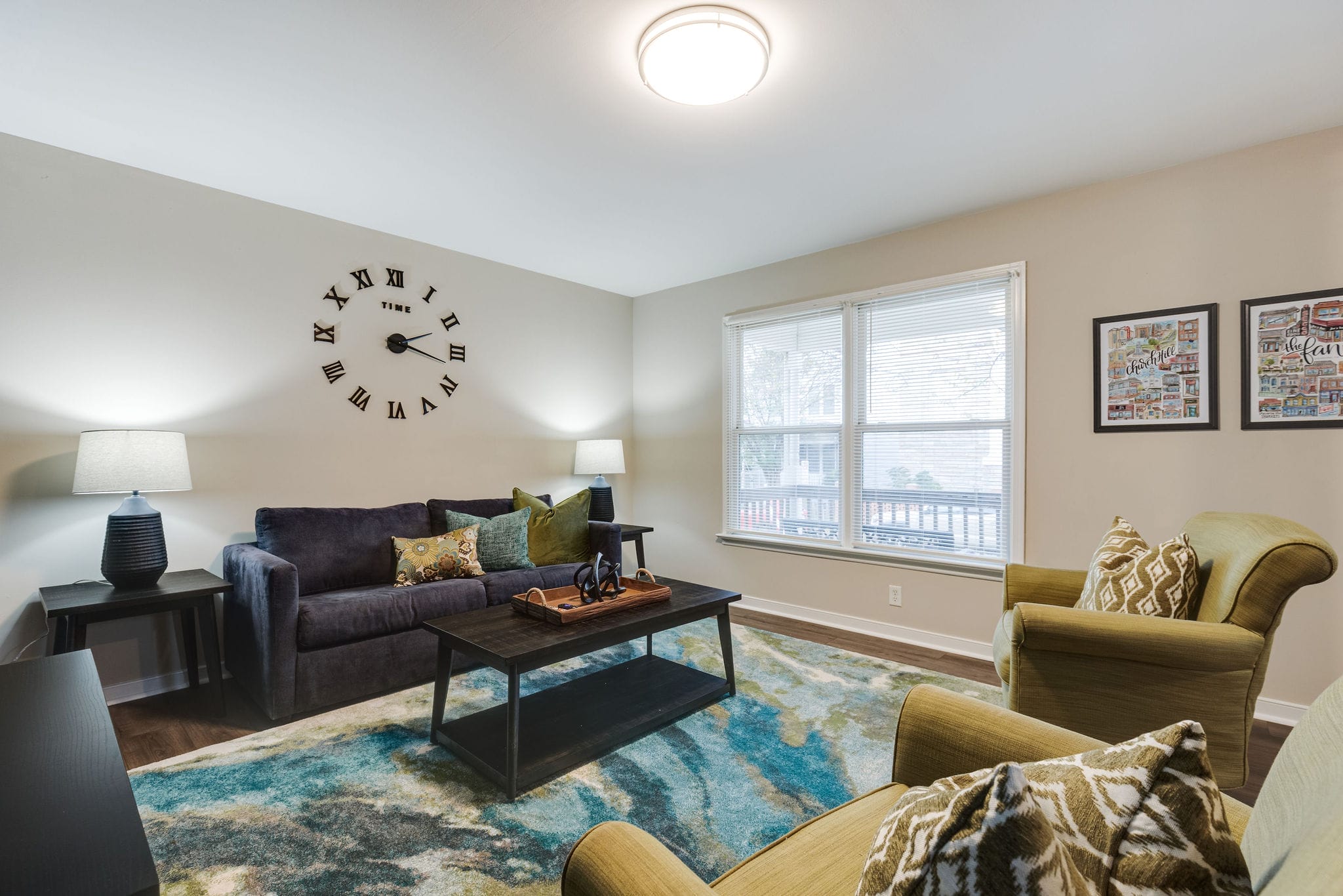 living room with blue sofa