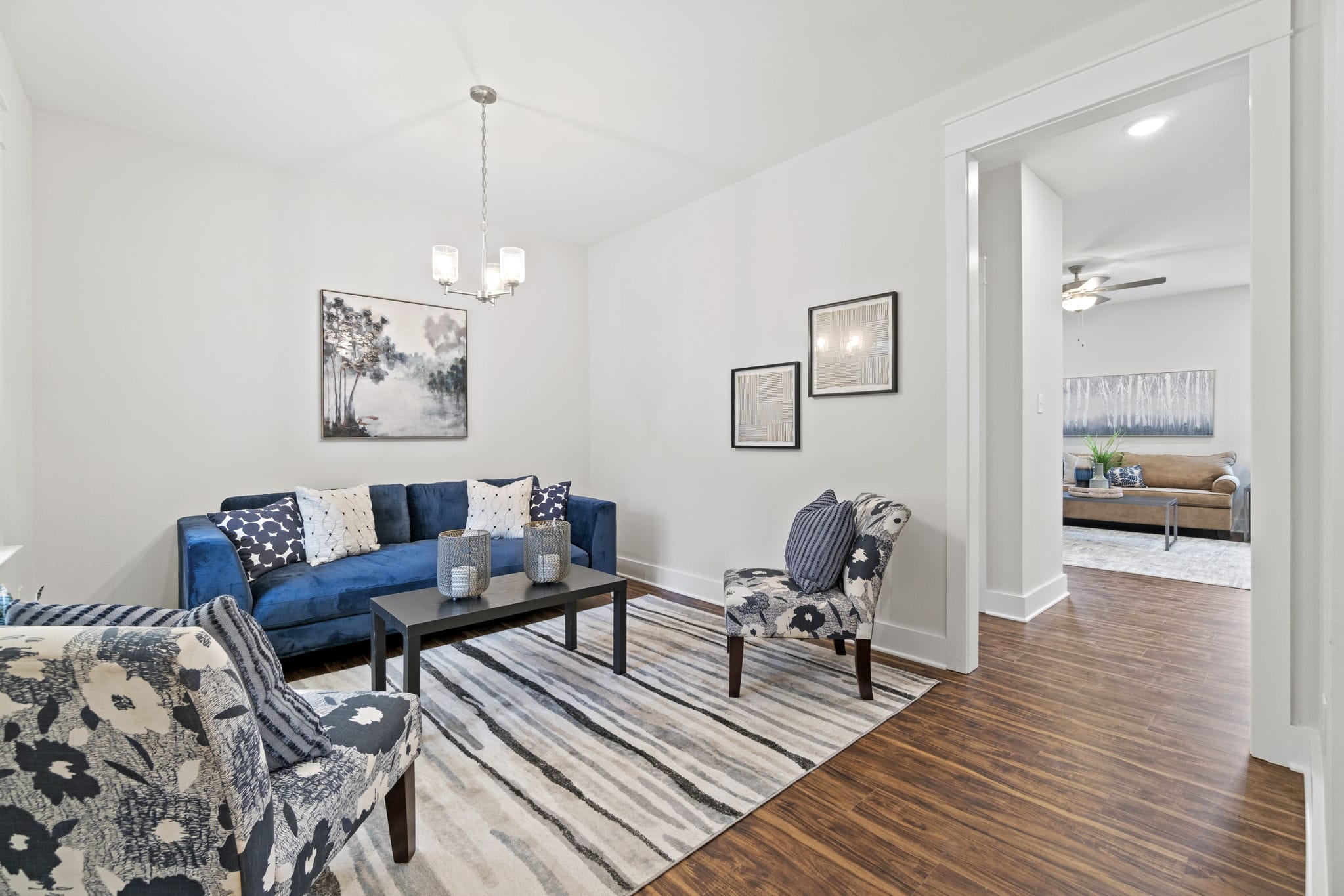 living room with blue sofa