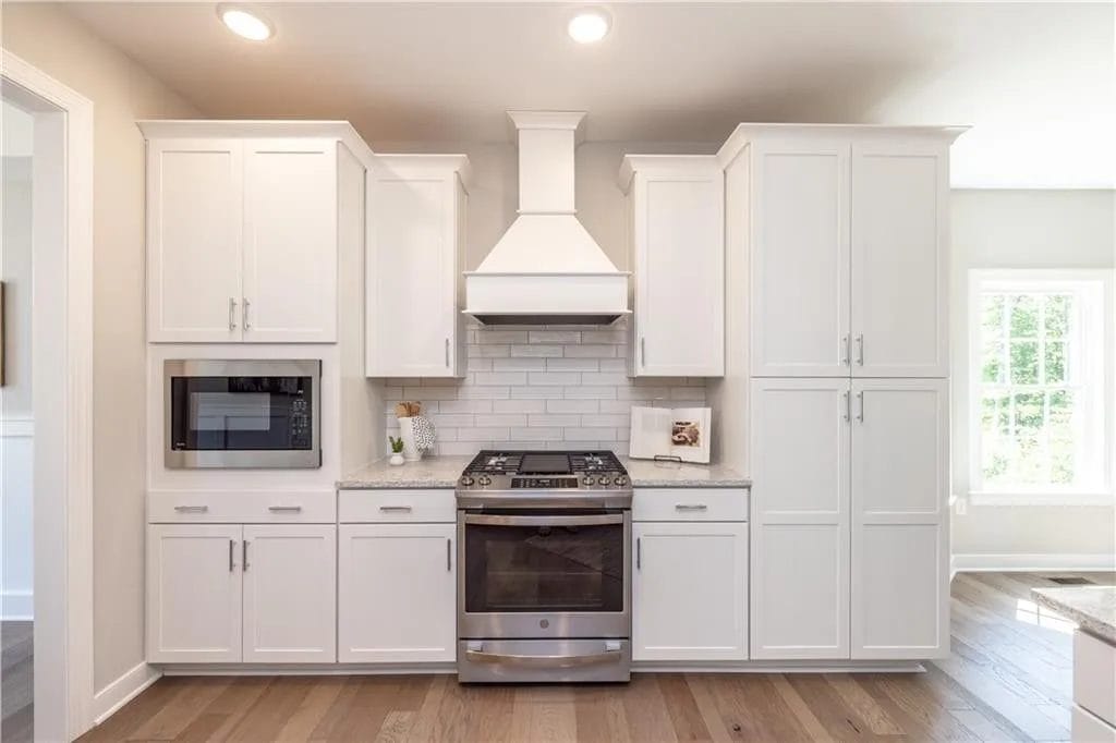 kitchen with white cabinets