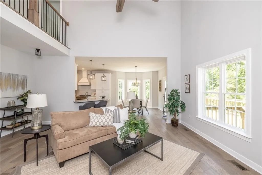 living room with beige sofa